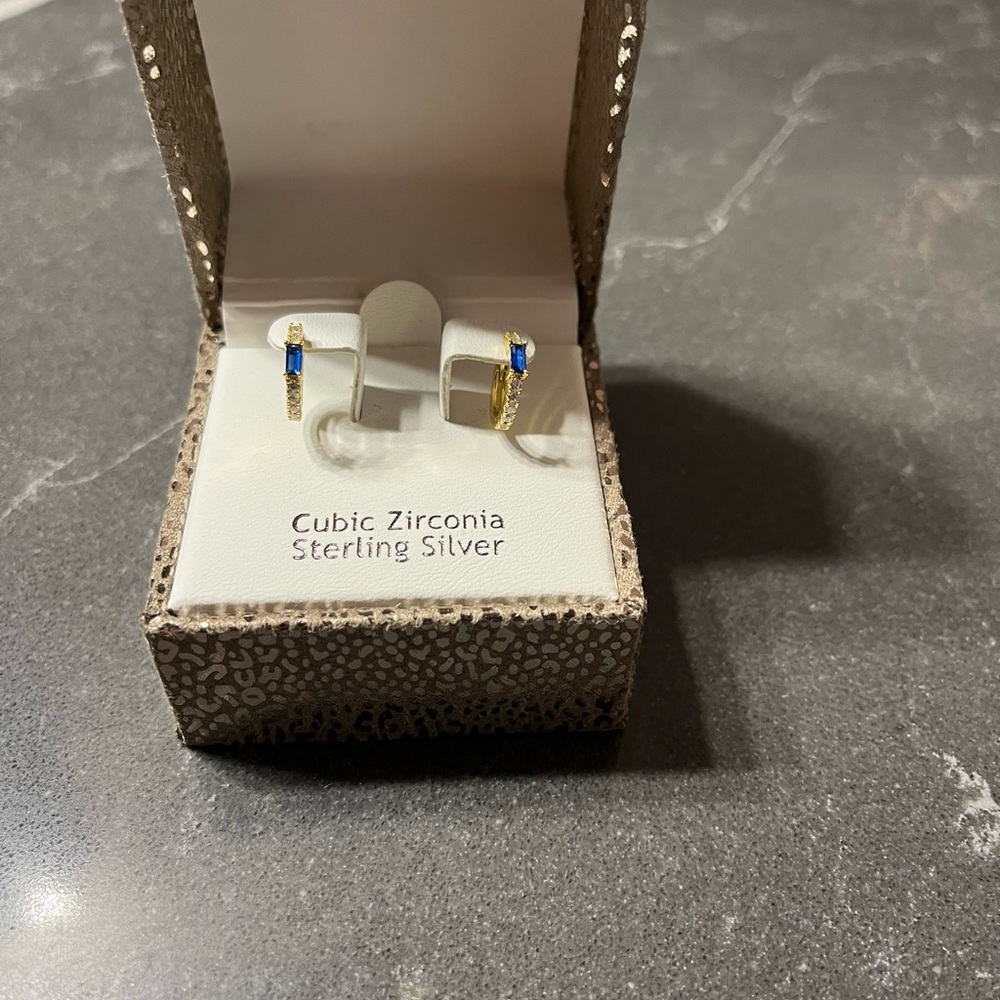 Lab created sapphire gold plated sterling silver huggie hoops